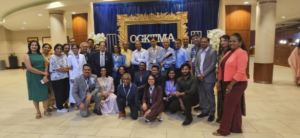 Alumni group at the OGKTMA frame
